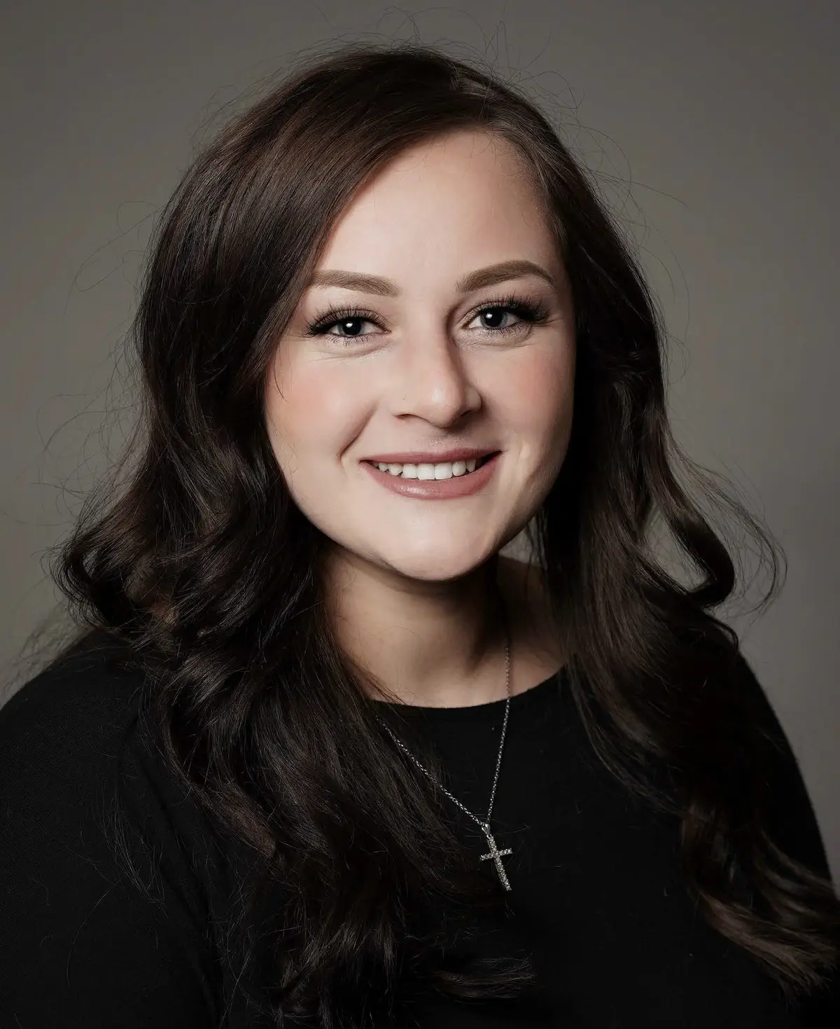 Professional headshot of Clarissa Smith, real estate agent at Champion Realty.